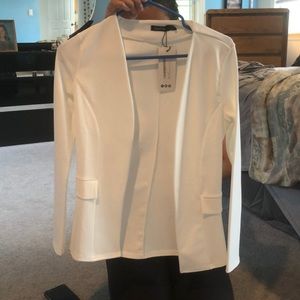 Ivory collarless blazer